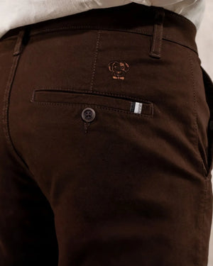 Close-up photo of men's dark brown -colored stretch chino pants by DANTE.