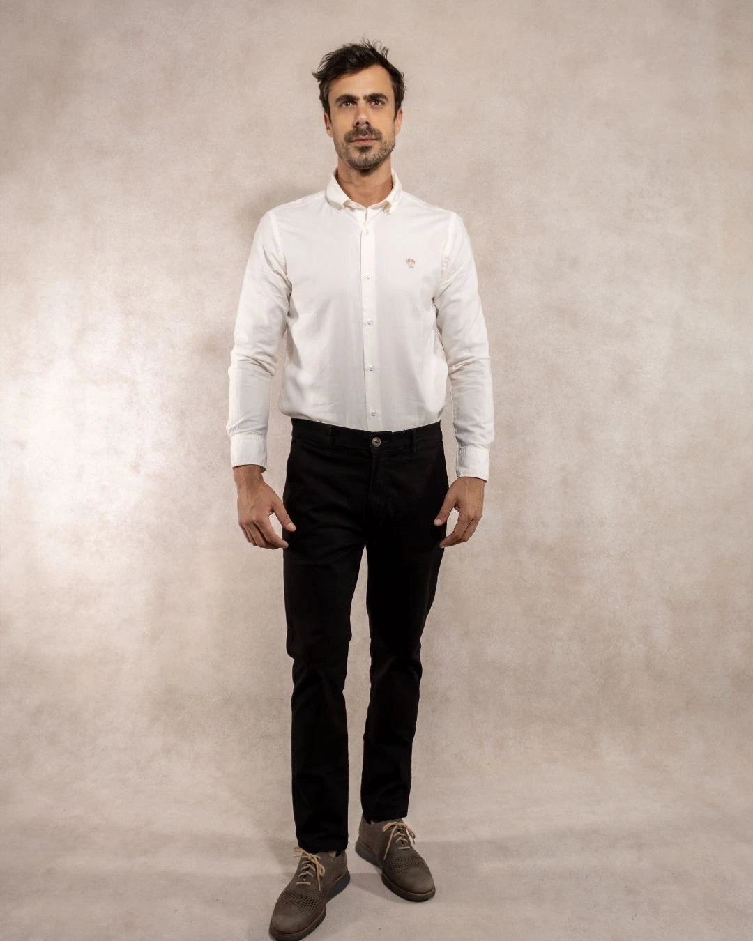 Full-body photo of men's black stretch chino pants by DANTE.