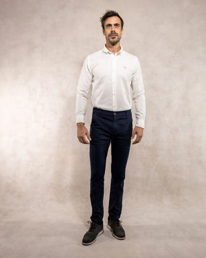 Full-body photo of men's navy blue stretch chino pants by DANTE.