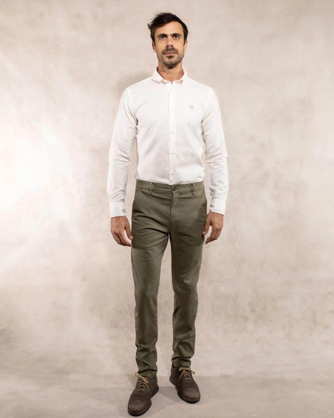 Full-body photo of men's light green stretch chino pants by DANTE.