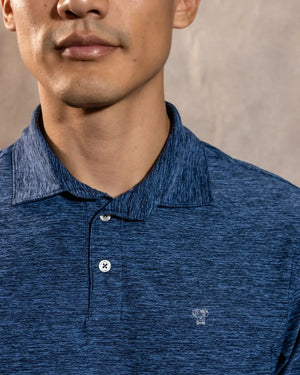 Polo Performance Antiarrugas Azul Jaspe para hombre marca DANTE tallaje regular fit foto logo